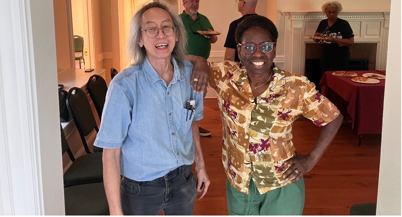 Leon and Janet standing together at their retirement party