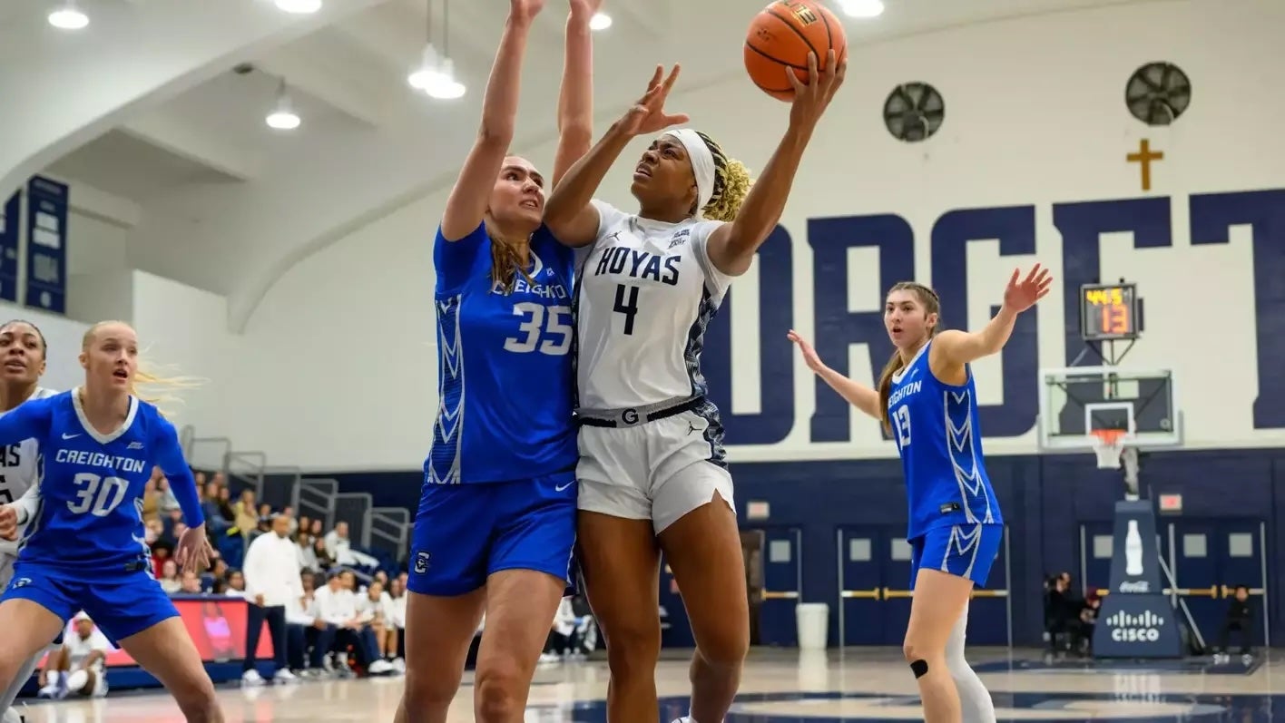 Destiny Agubata playing basketball against Creighton